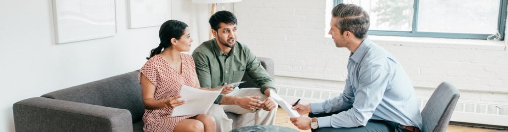 Clients talk to a representative of the company