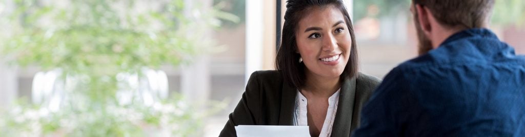 Woman smiling and talking