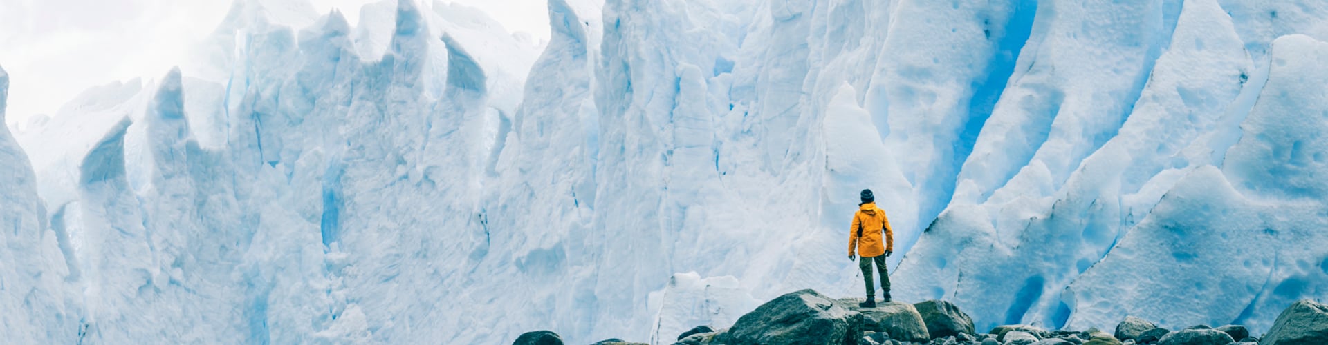 Hiker admiring glacier