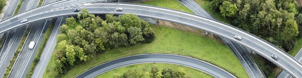 Cars driving on roads